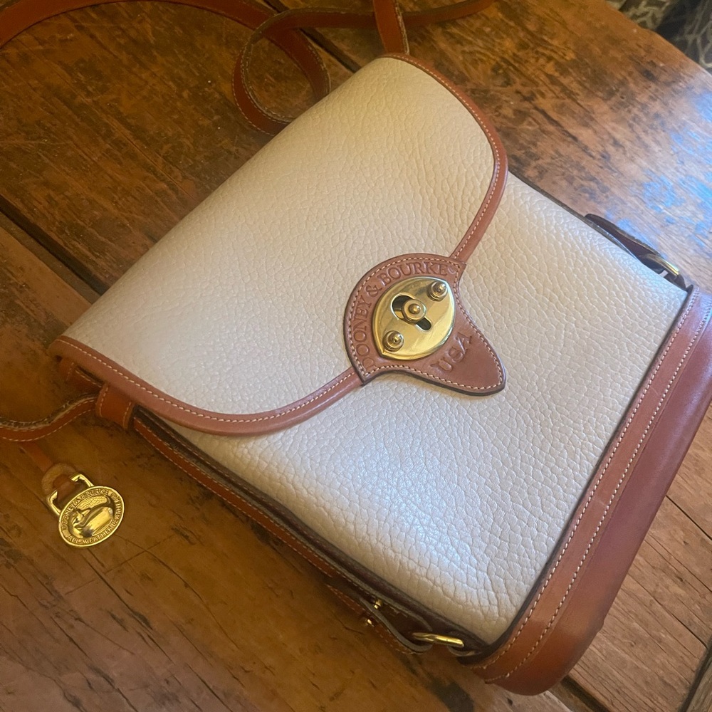 Vintage Dooney & Bourke Cream and Brown Calvary Spectator crossbody.